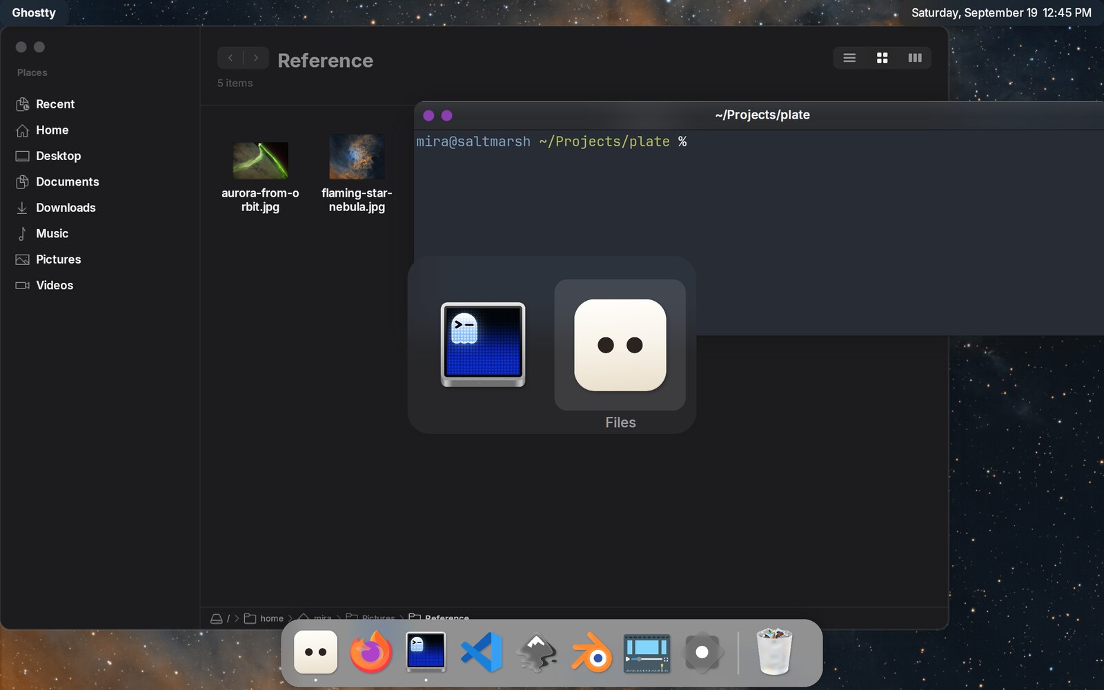 The app switcher over the desktop, showing two running applications with Files selected