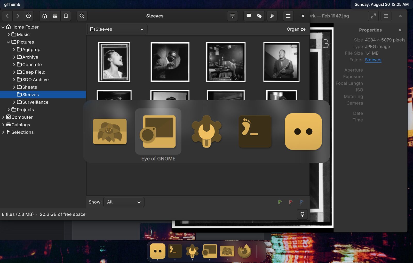 The app switcher over the same desktop, its icons tinted gold to match