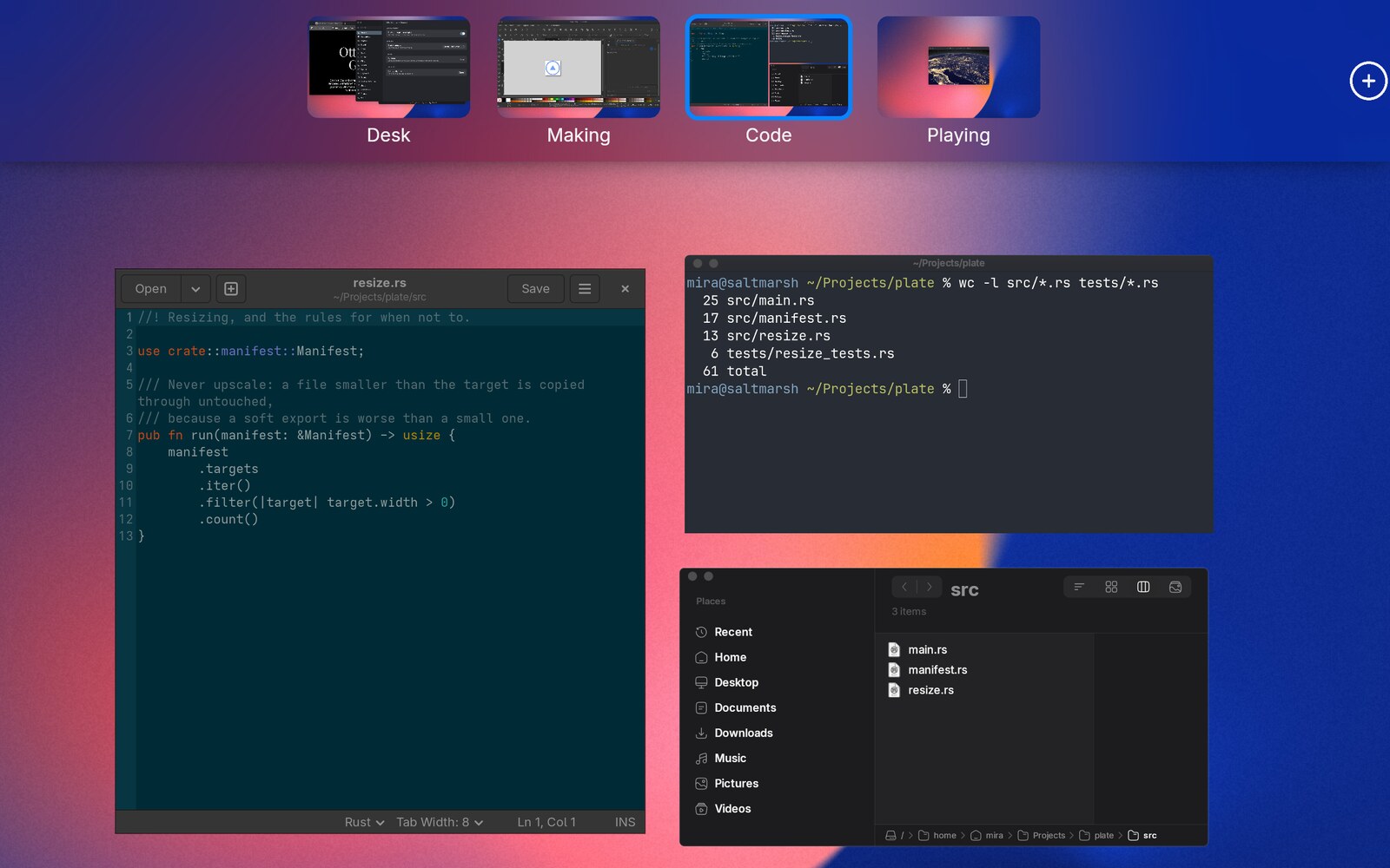 The workspace selector above the window grid, with four named workspaces: Desk, Making, Code and Playing